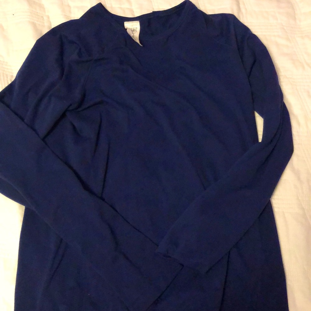 This is athleta girl shirt, that is long sleeve and is color dark blue.